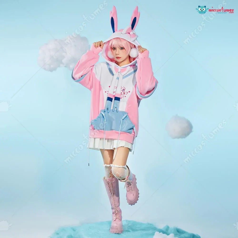 Full body view of a person wearing a pink and white cosplay hoodie with a bunny ear hood