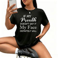 A woman wearing a black short-sleeved t-shirt with white text reading: If my mouth doesn't say it my face definitely will.