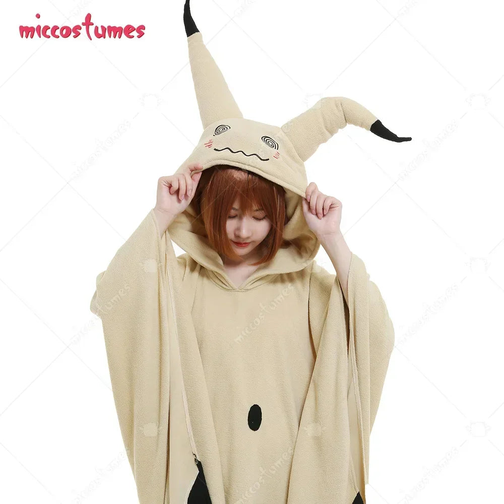 Close-up of a beige hooded cosplay poncho showing the face details on the hood.