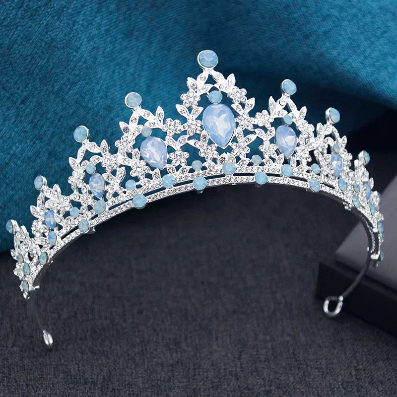 Silver tiara with light blue teardrop and round rhinestones