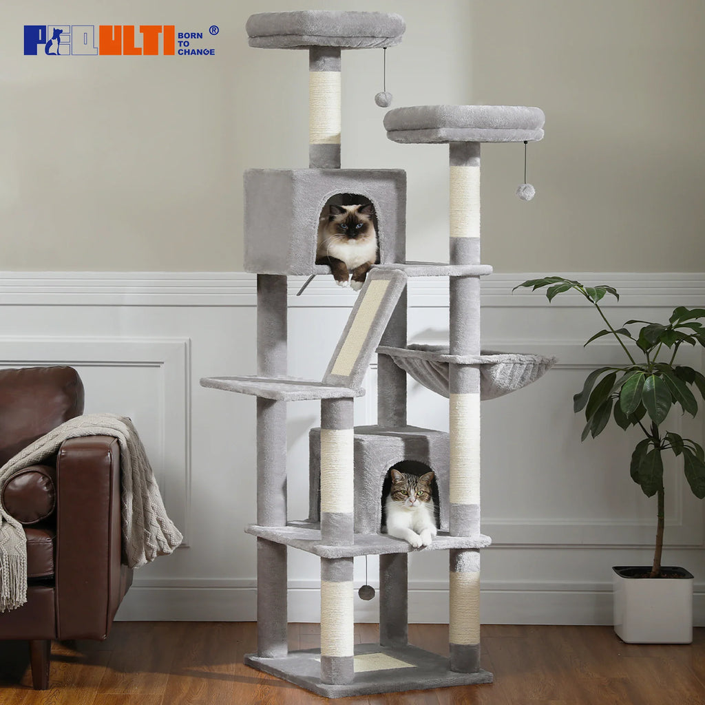 Large multi-level grey plush cat tree tower with scratching posts, perches, and condos with two cats.