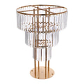 Three-tier gold metal stand with hanging crystal prisms for floral centerpieces.