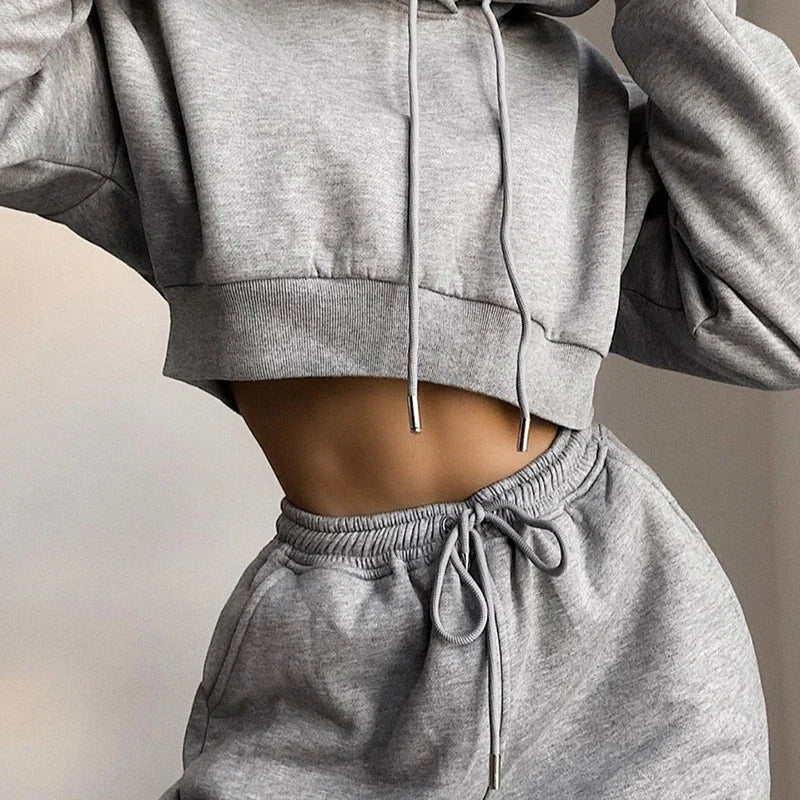 Grey long-sleeve crop hoodie and matching sweatpants set