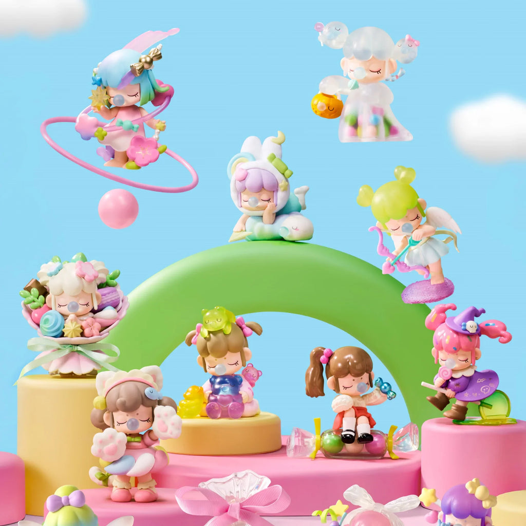A collection of 8 different small whimsical girl figurines with various sweet treats, candy, and magical accessories.