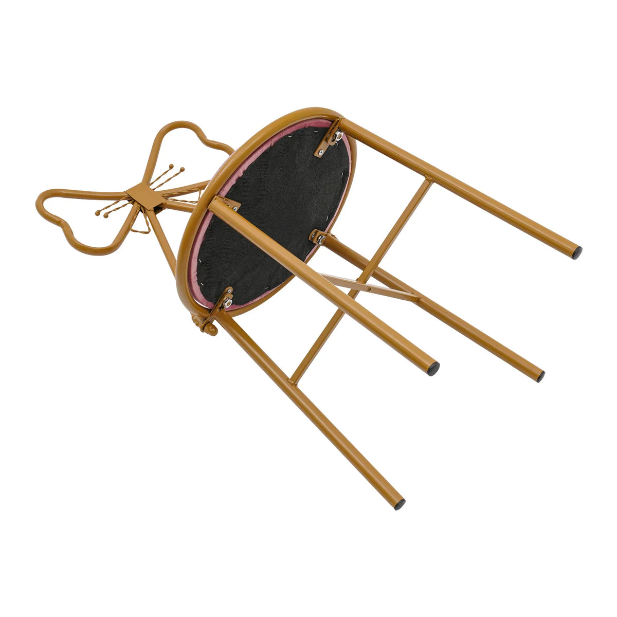 An overturned pink velvet vanity stool showing the metal leg attachment and black underside.