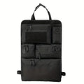 Black tactical car seat back organizer shown on a plain white background