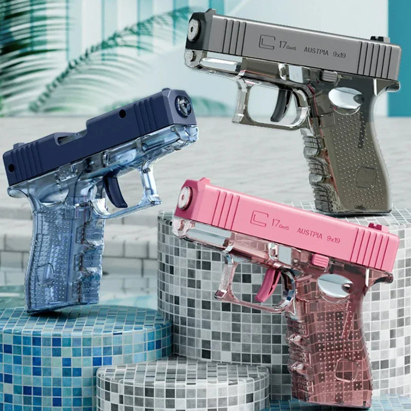 Three transparent water pistol toys in grey blue and pink