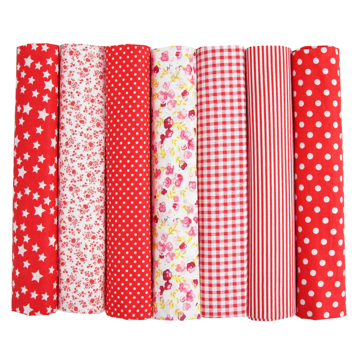 Seven rolls of red fabric with various patterns including stars, flowers, dots, stripes, and gingham.