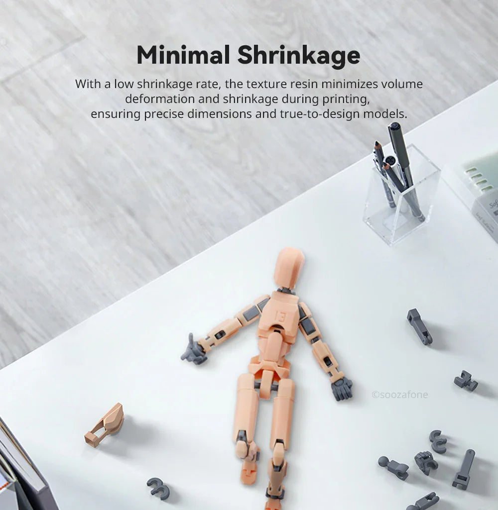 Articulated mannequin figurine on a table, illustrating minimal resin shrinkage.