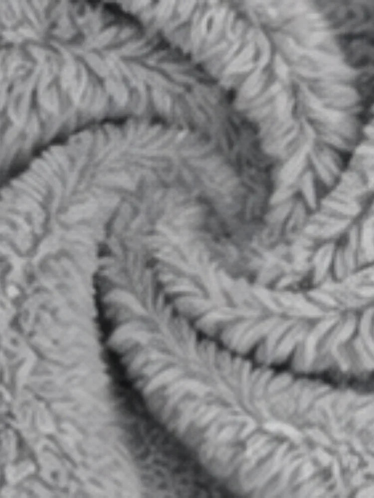 Close-up detail of the soft, fuzzy gray fleece material of the hoodie.