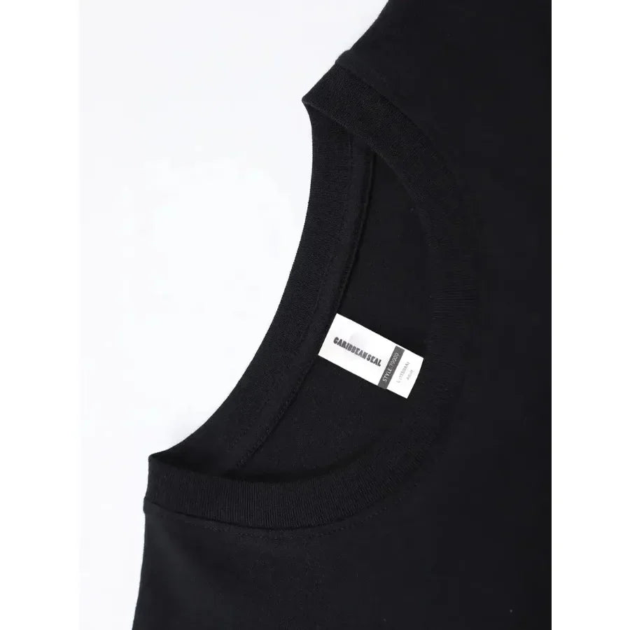 Close-up of the neckline and internal brand label of a plain black t-shirt.