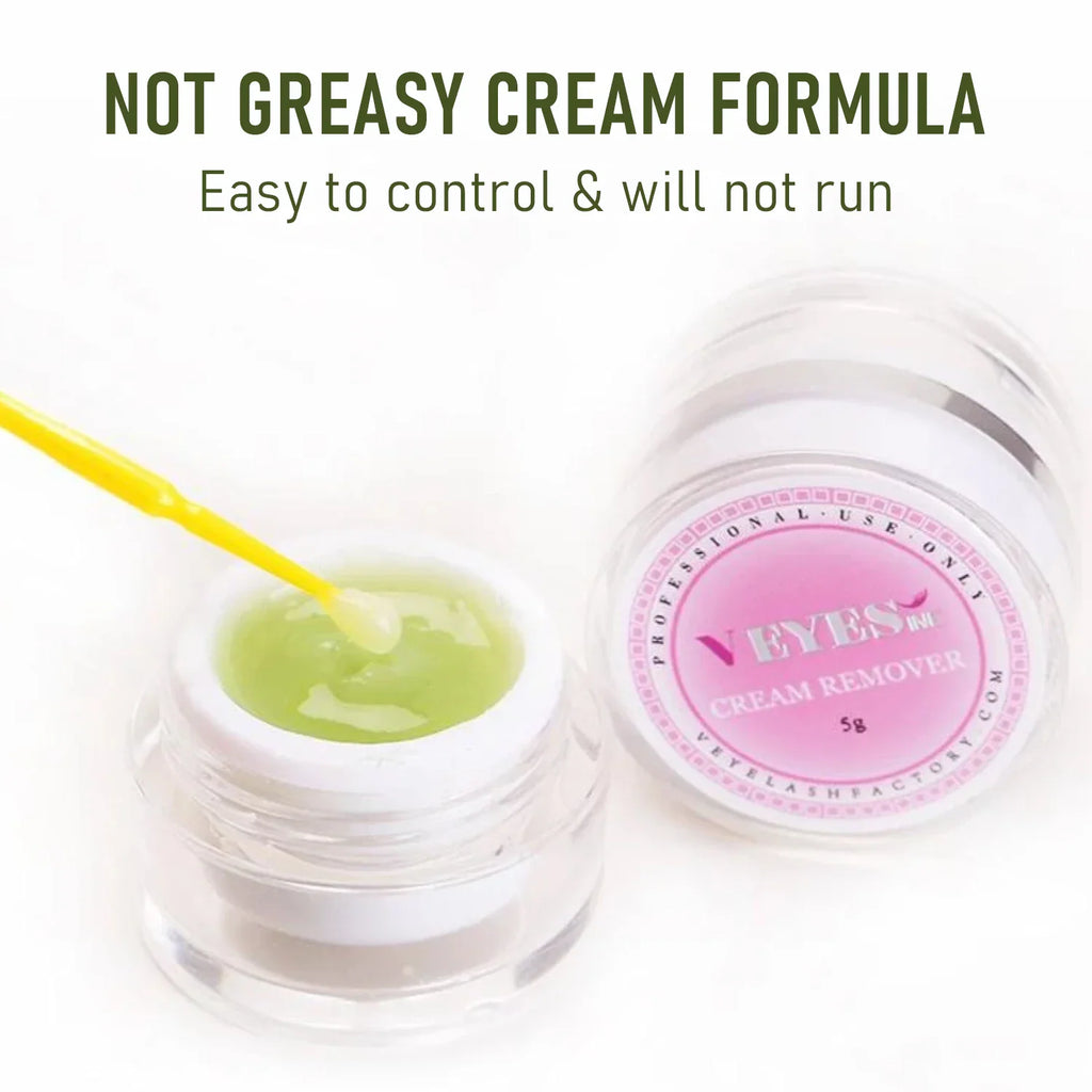 A small jar of green eyelash extension cream remover being used with a yellow applicator brush.