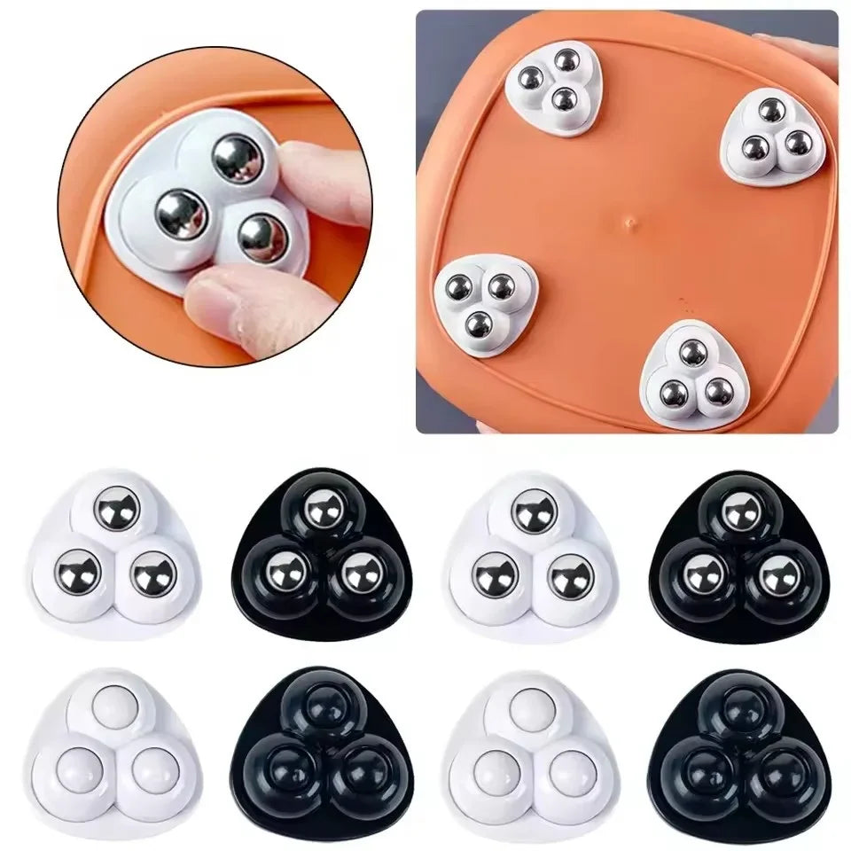 A set of triangular self-adhesive universal wheels with stainless steel ball bearings in black and white colors.