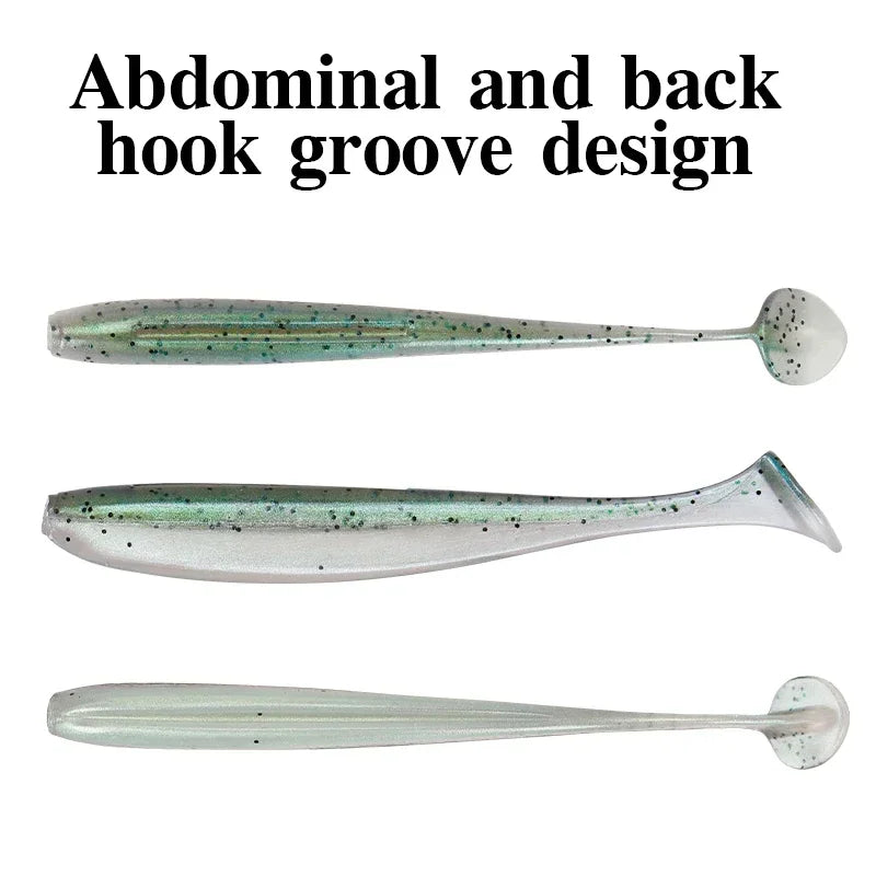 Three views of a T-tail soft plastic lure showing the hook groove design
