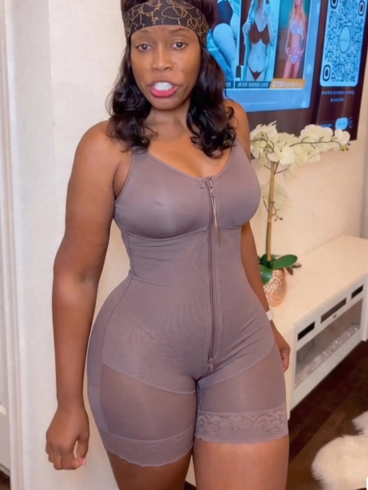 Brown full body shaper bodysuit with front zipper and lace leg hem