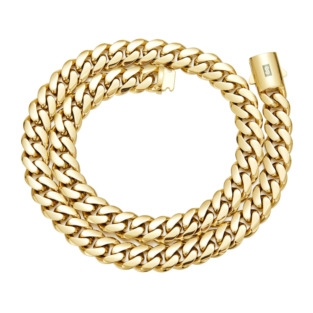 A thick gold cuban link chain coiled on a white background