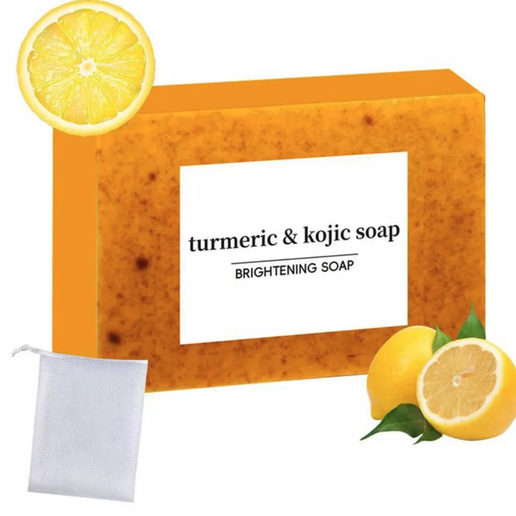Turmeric and kojic brightening soap bar with a mesh pouch and lemon slices