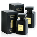 Two black perfume bottles with matching black boxes on a white background.