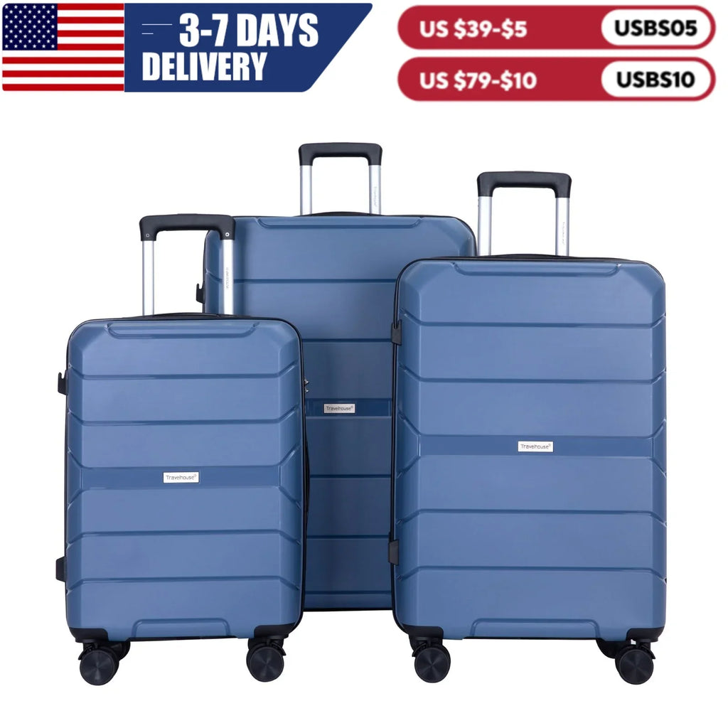 A set of three blue hardshell suitcases with spinner wheels.
