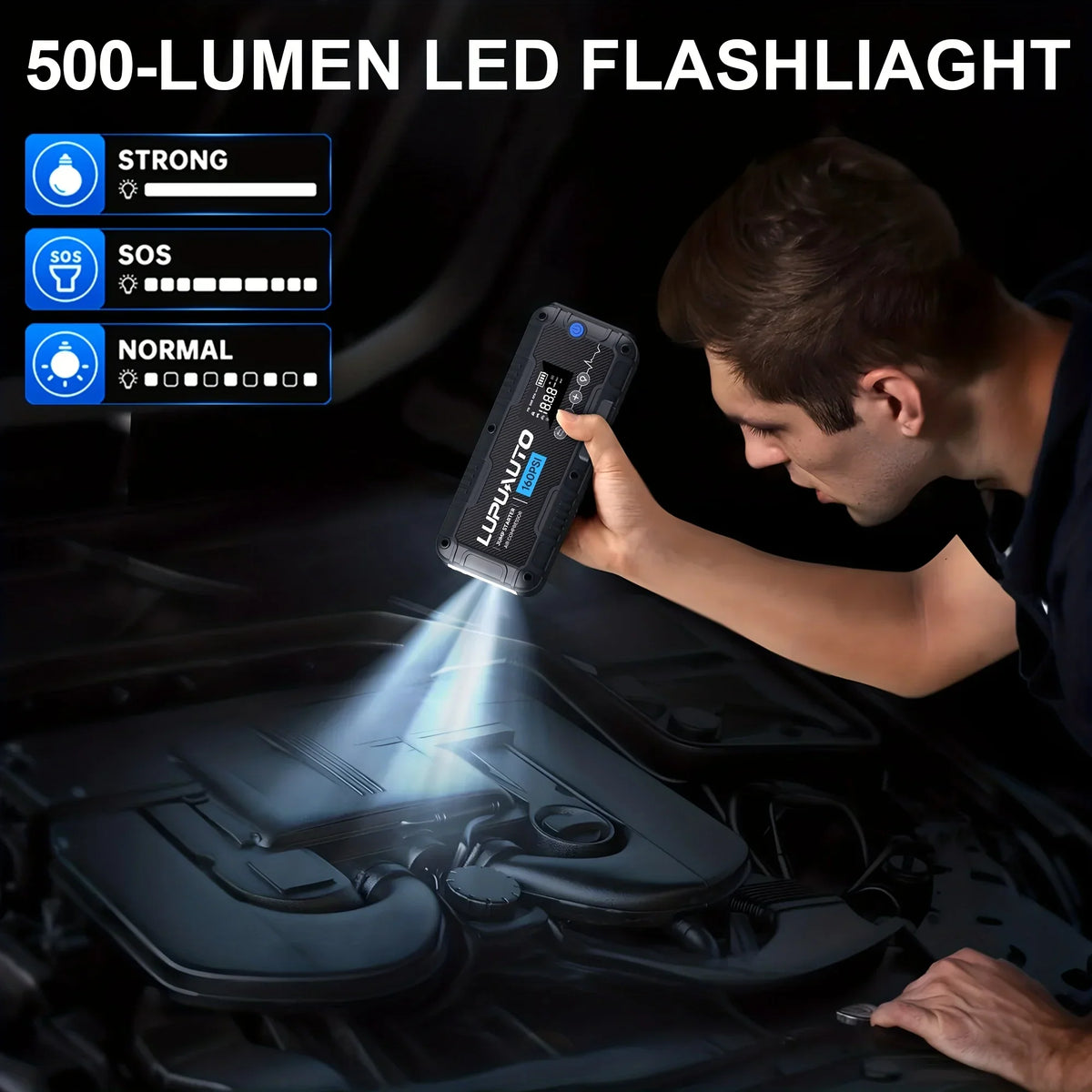Person using a portable jump starter as a LED flashlight to inspect a car engine