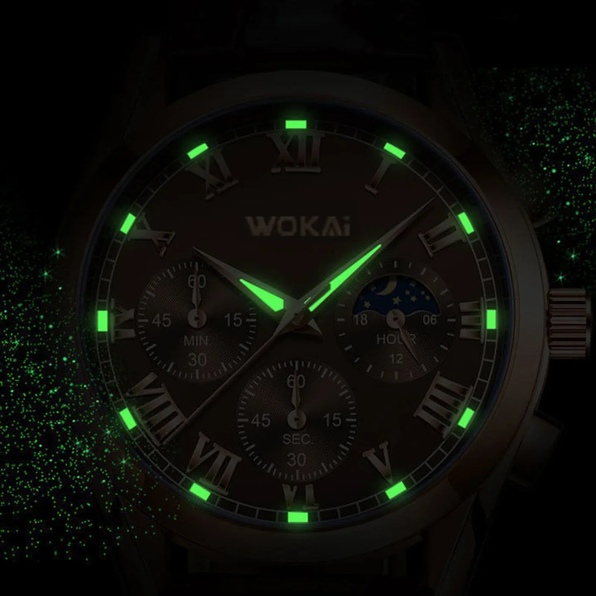 Rose gold tone quartz watch dial with glowing luminous hands and markers in the dark