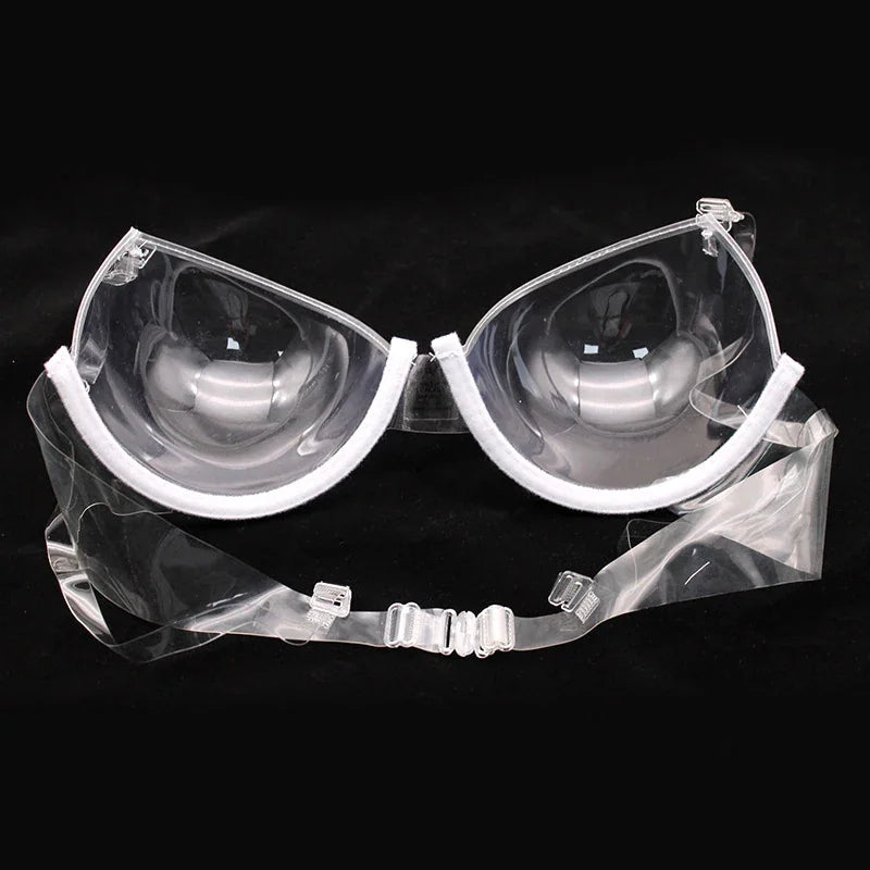 Transparent plastic bra with white trim and clear adjustable straps.