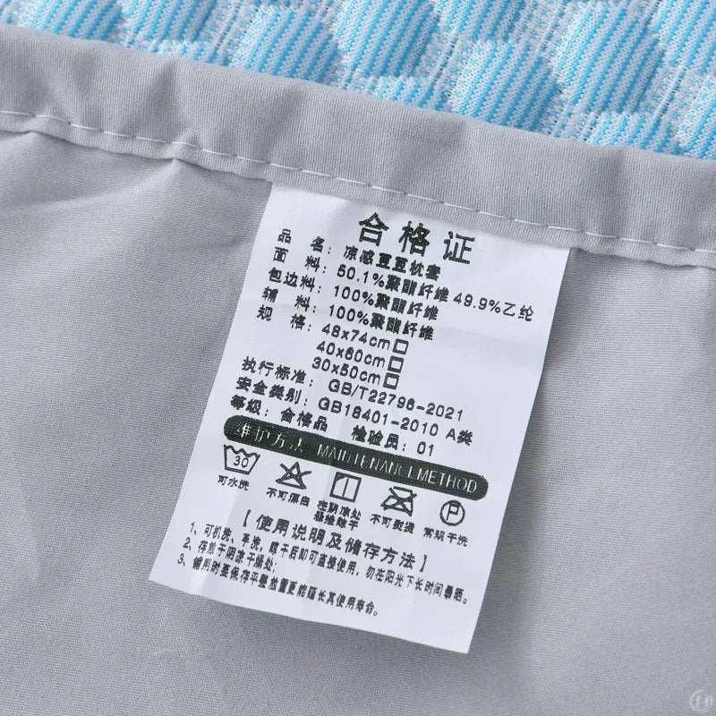 Care and manufacturing label on a blue pillowcase