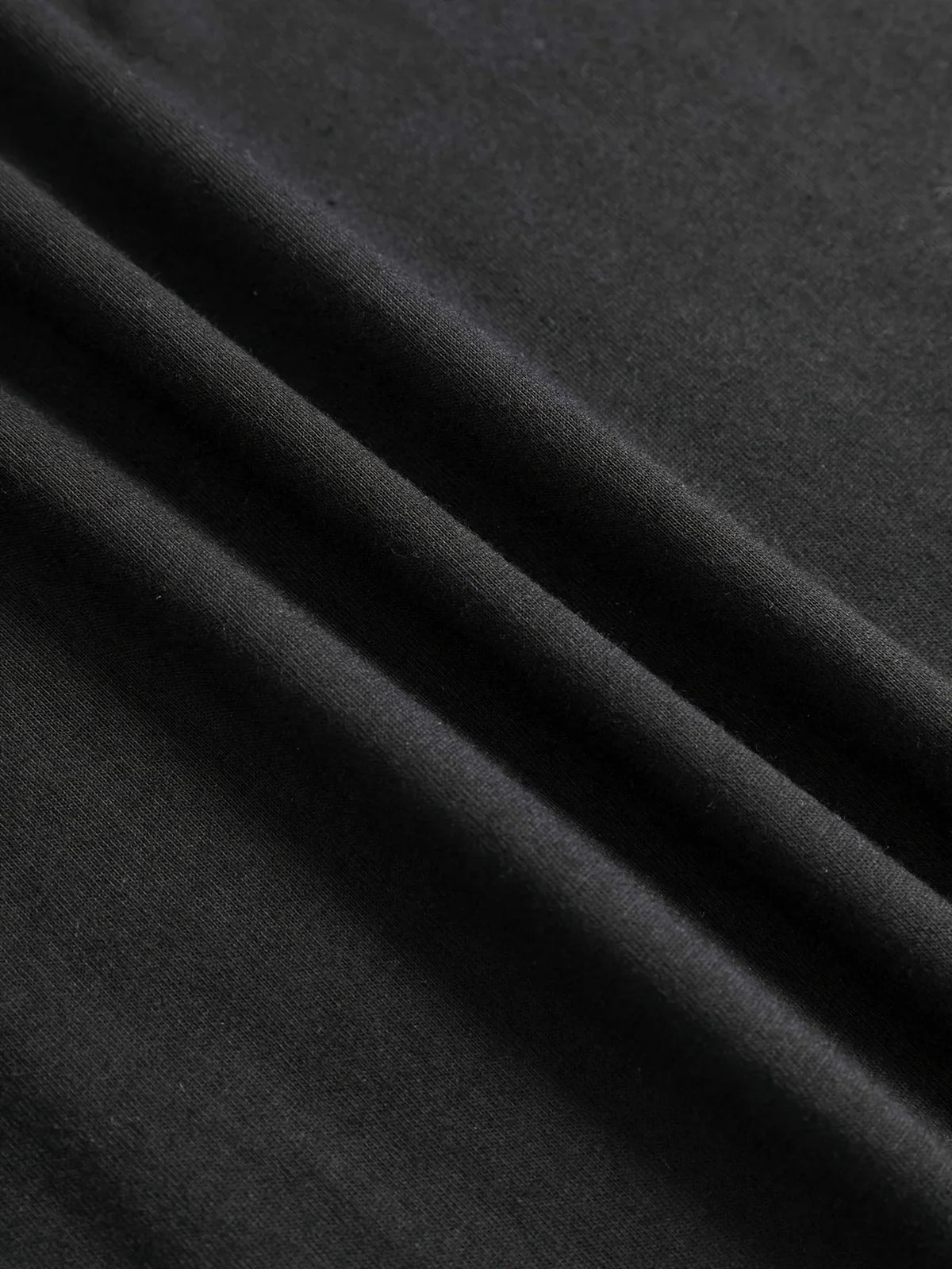 Close up fabric texture of a black t-shirt