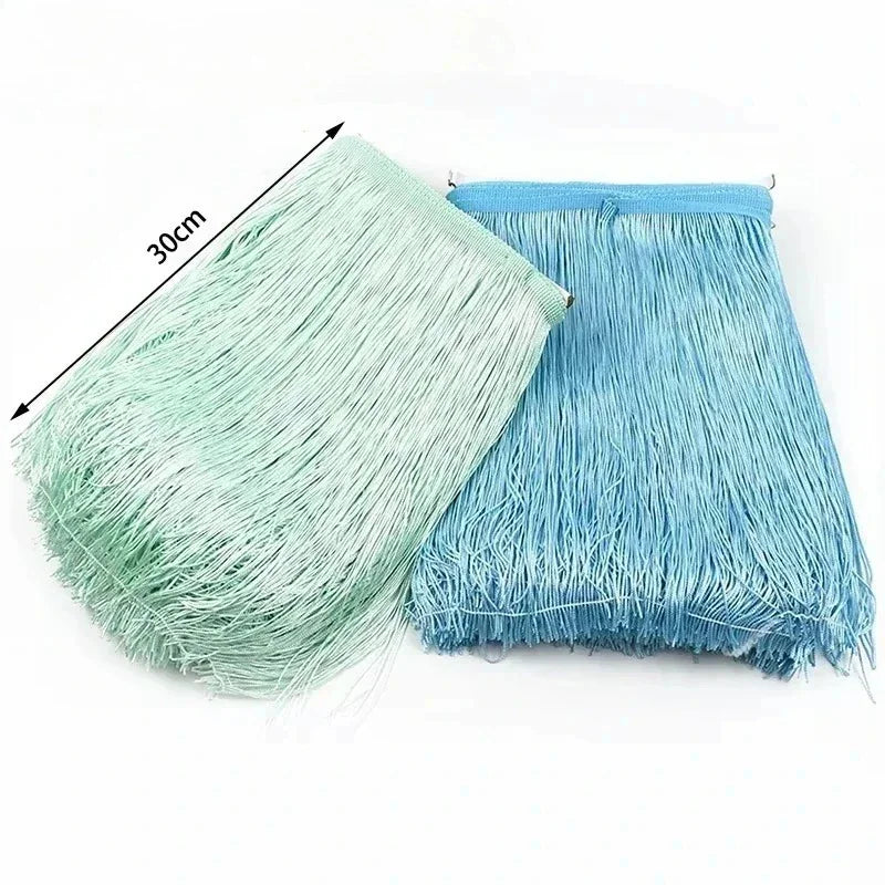 Two rolls of light blue and mint green long tassel fringe trim