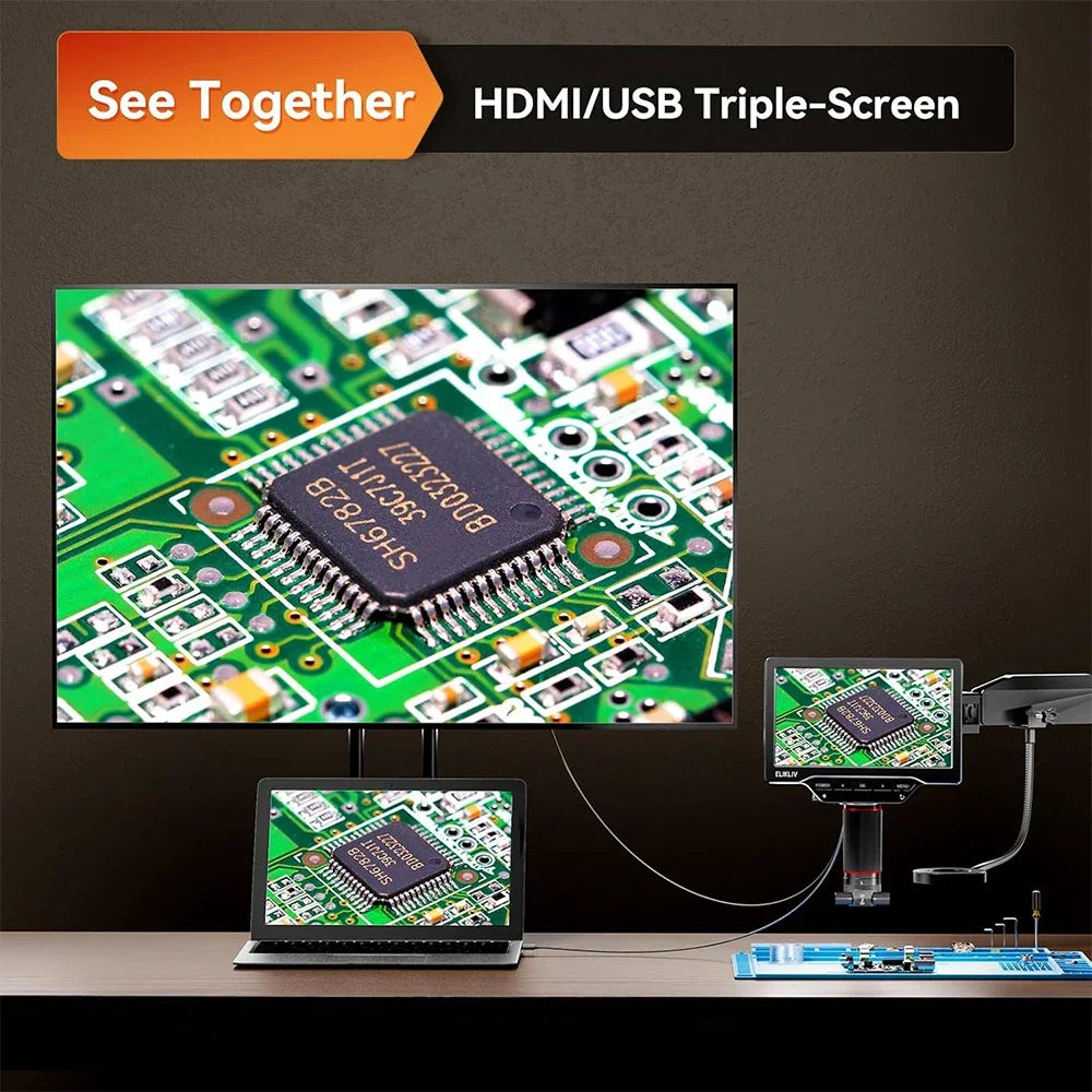 Digital microscope connected to a laptop and large monitor for triple screen output of PCB inspection.