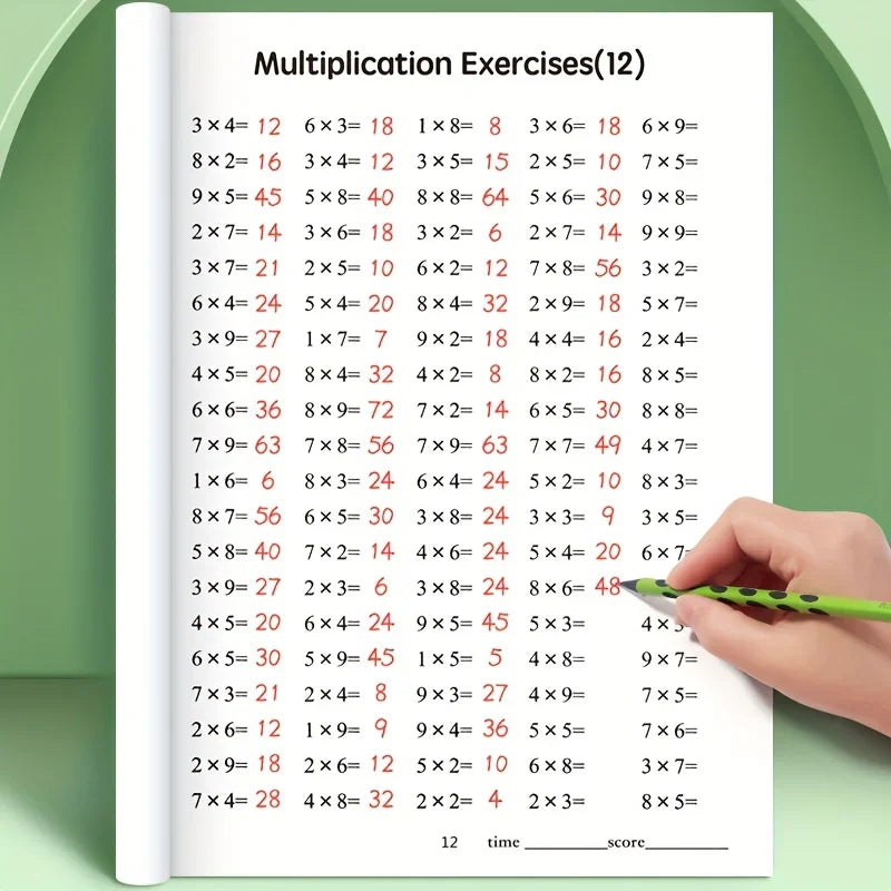 A hand using a green pen to complete a page of multiplication exercises in a workbook.