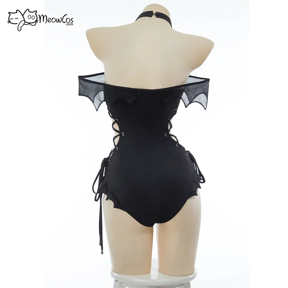 Back view of a mannequin in a black one-piece swimsuit with bat wing style trim