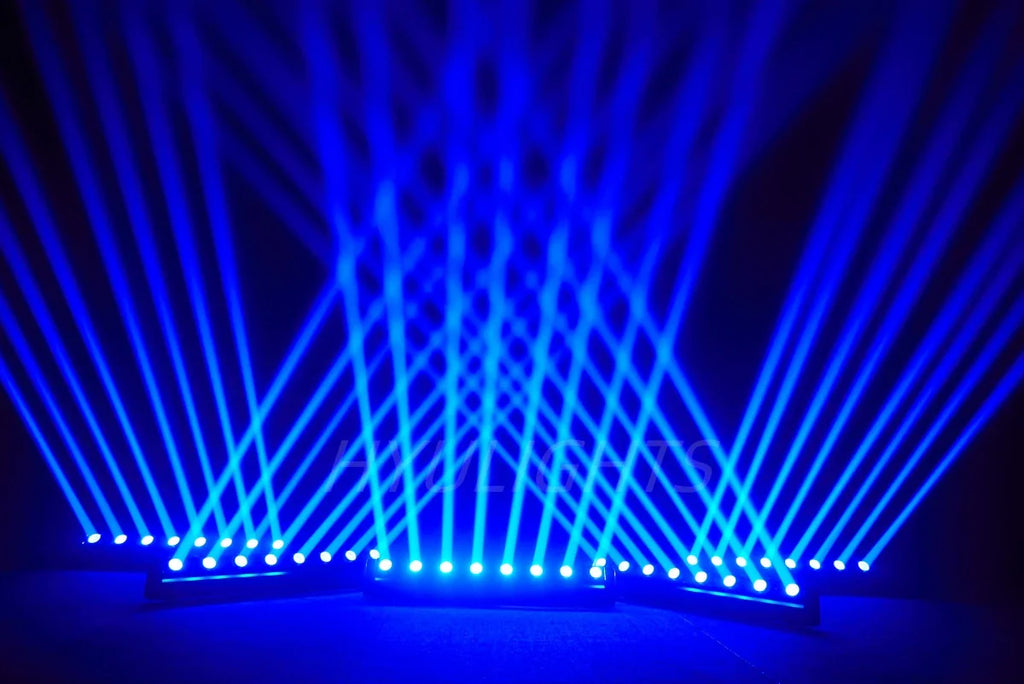 Three LED bar beam lights creating blue light beams in a dark environment