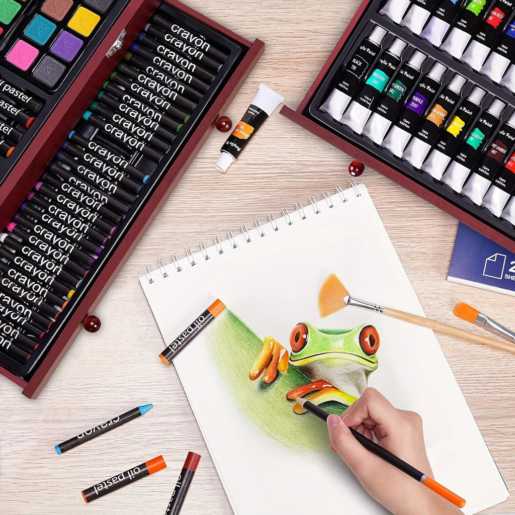 An open wooden art kit with various drawing tools and a sketch being colored by hand.