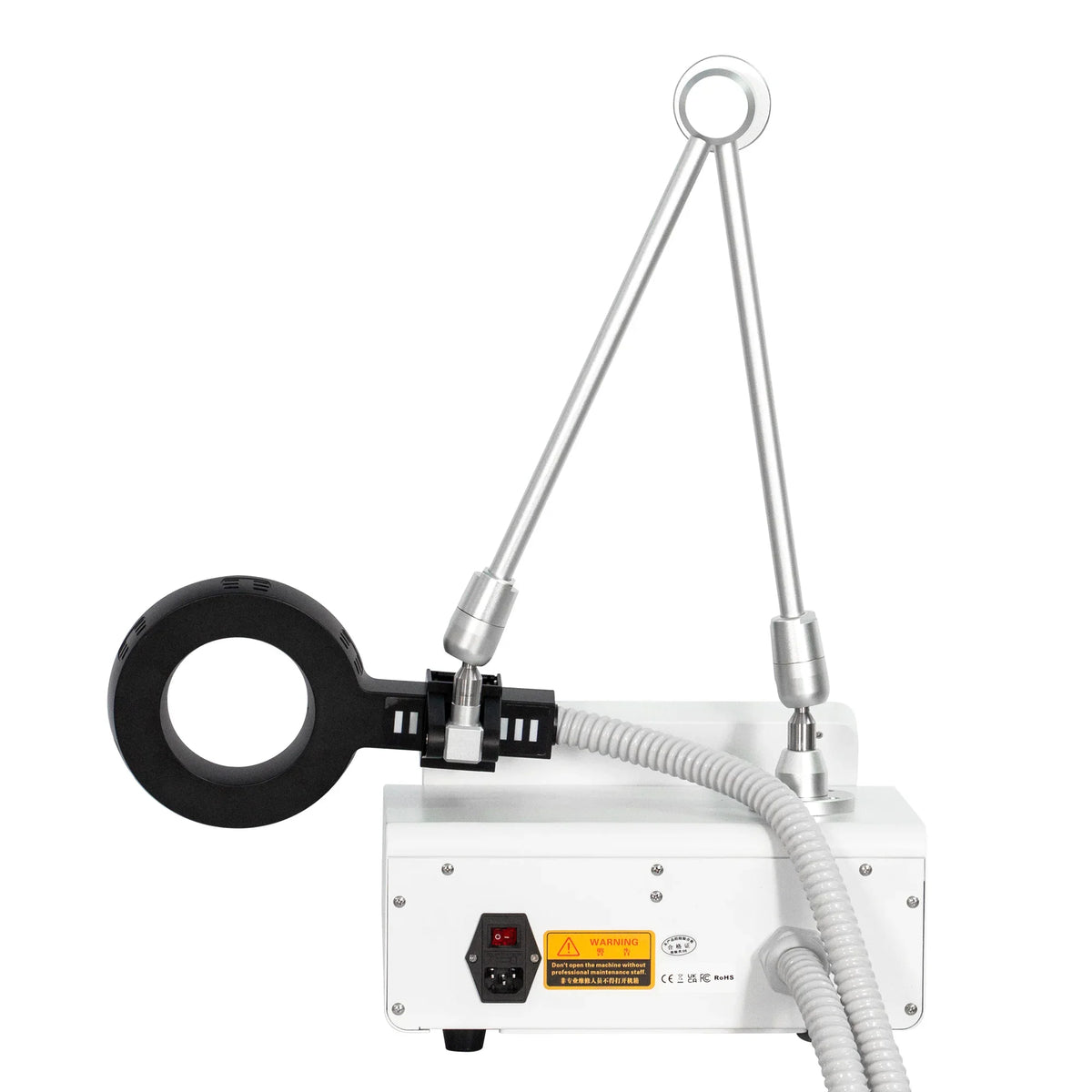 The rear view of an electromagnetic therapy machine showing the power input and warning labels