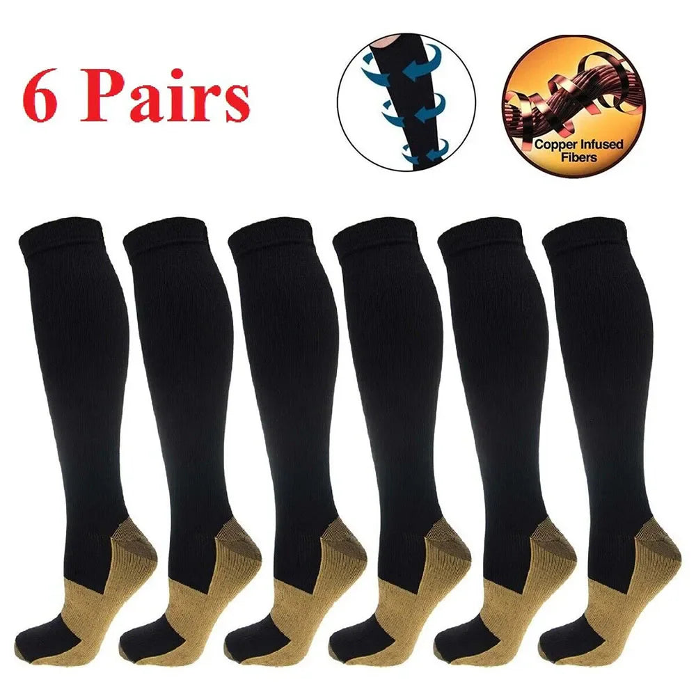 Six pairs of black knee-high compression socks with copper-infused toe and heel sections