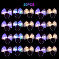 A grid display of twenty glowing LED tulle bow headbands