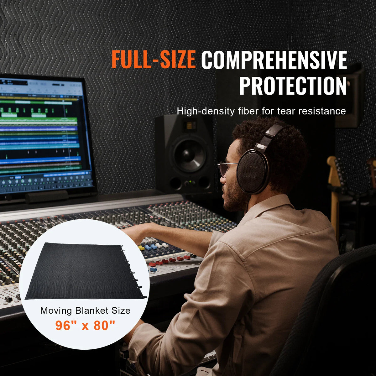 A person using a sound-dampening blanket for acoustic studio insulation