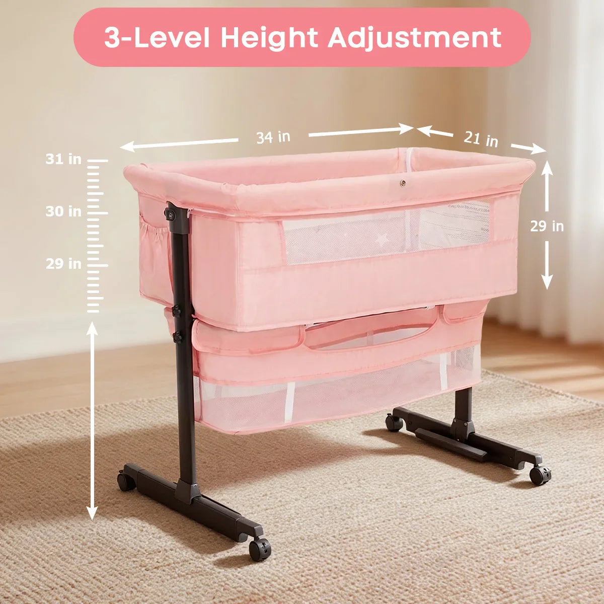 Pink baby bedside bassinet with three-level height adjustment dimensions indicated