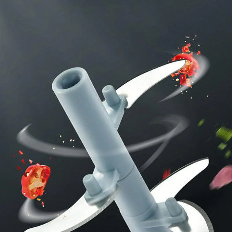 A close-up of a sharp stainless steel chopping blade for a food processor.