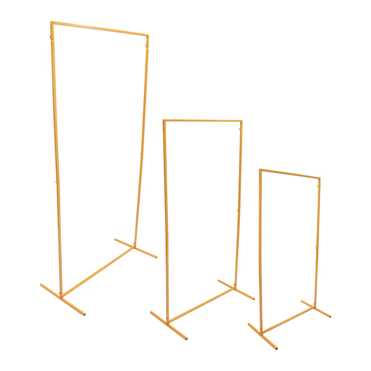 Set of three gold metal rectangular display stands viewed from a slight angle