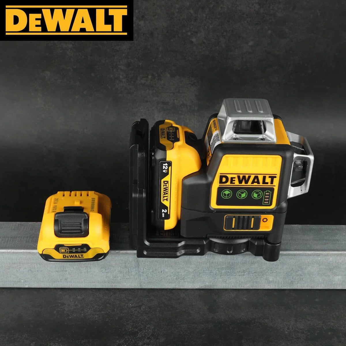 A 12V cordless green line laser level with a separate battery next to it.