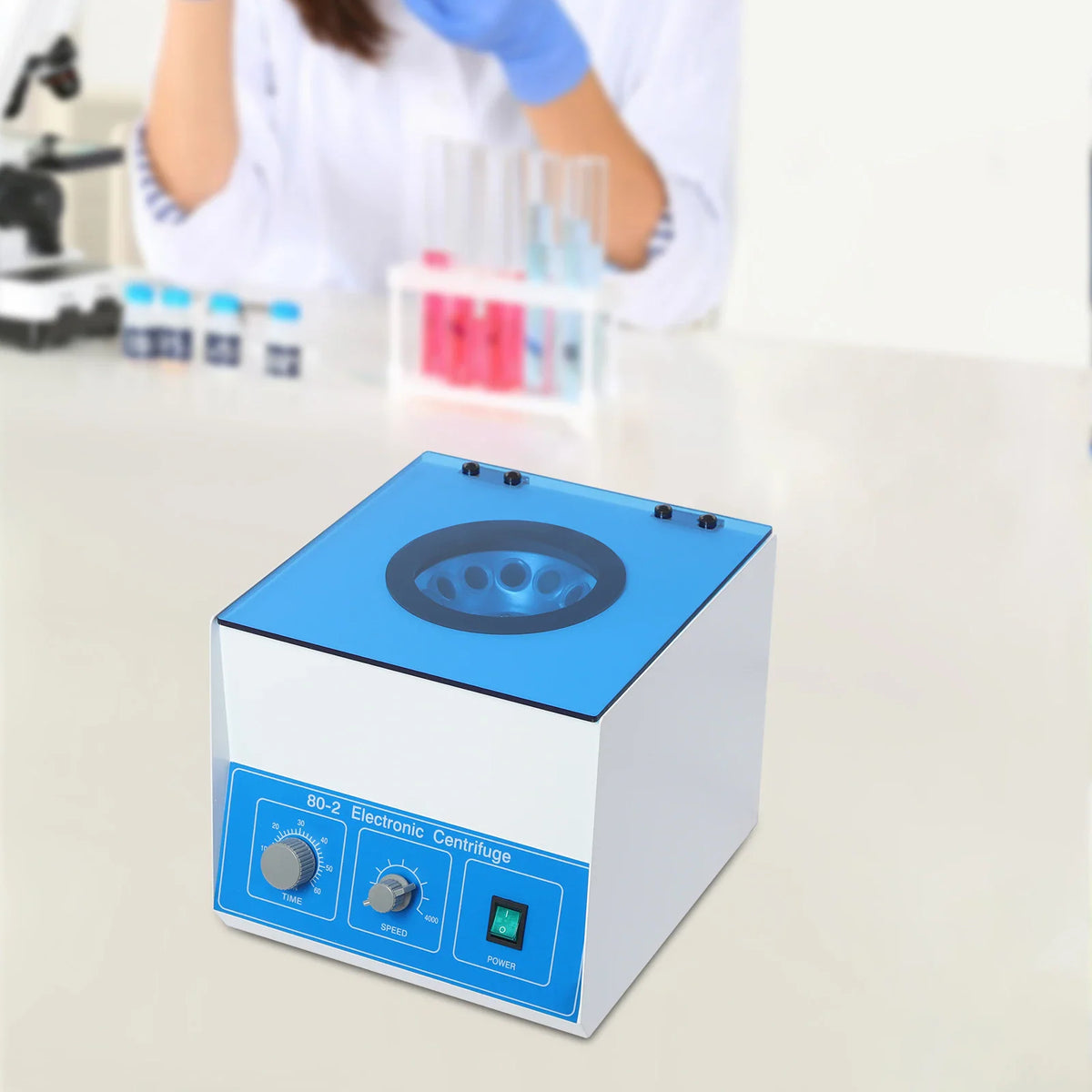 Desktop lab centrifuge machine with speed and time control knobs