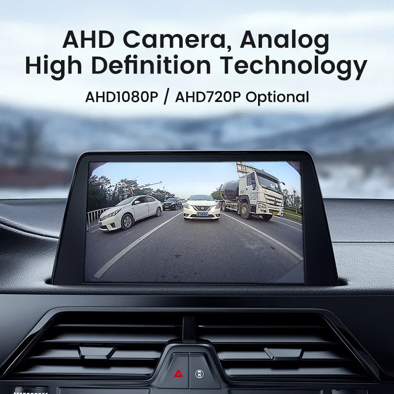 Car interior dashboard screen showing rear view camera footage