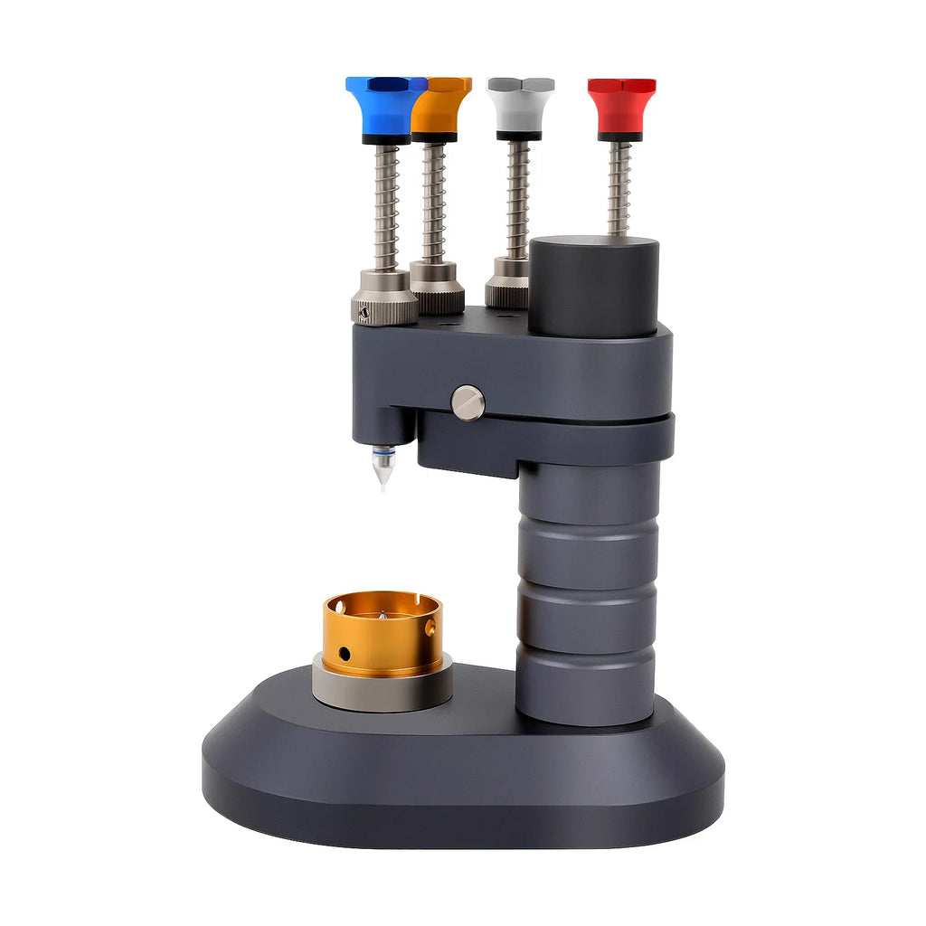 Black and grey 4-pin watch hand installation tool with steel and acrylic tips on a base