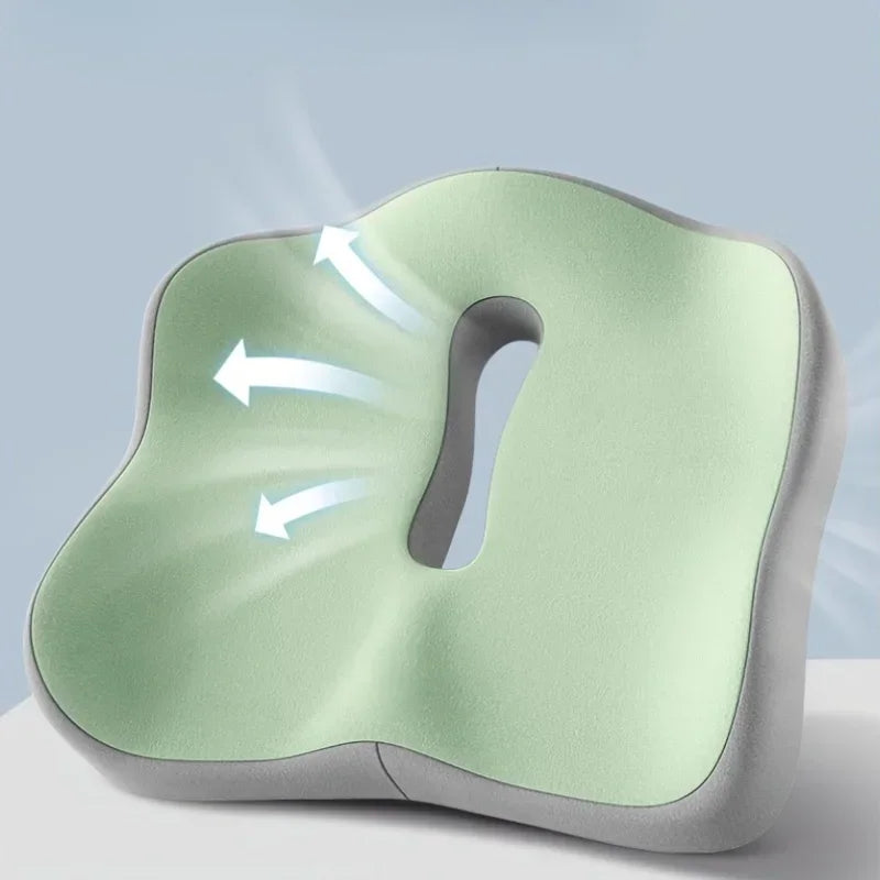 Green and grey ergonomic office seat cushion with airflow arrows