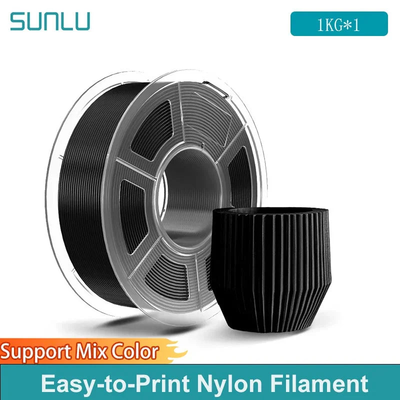 A spool of black nylon 3D printer filament next to a 3D printed cup.