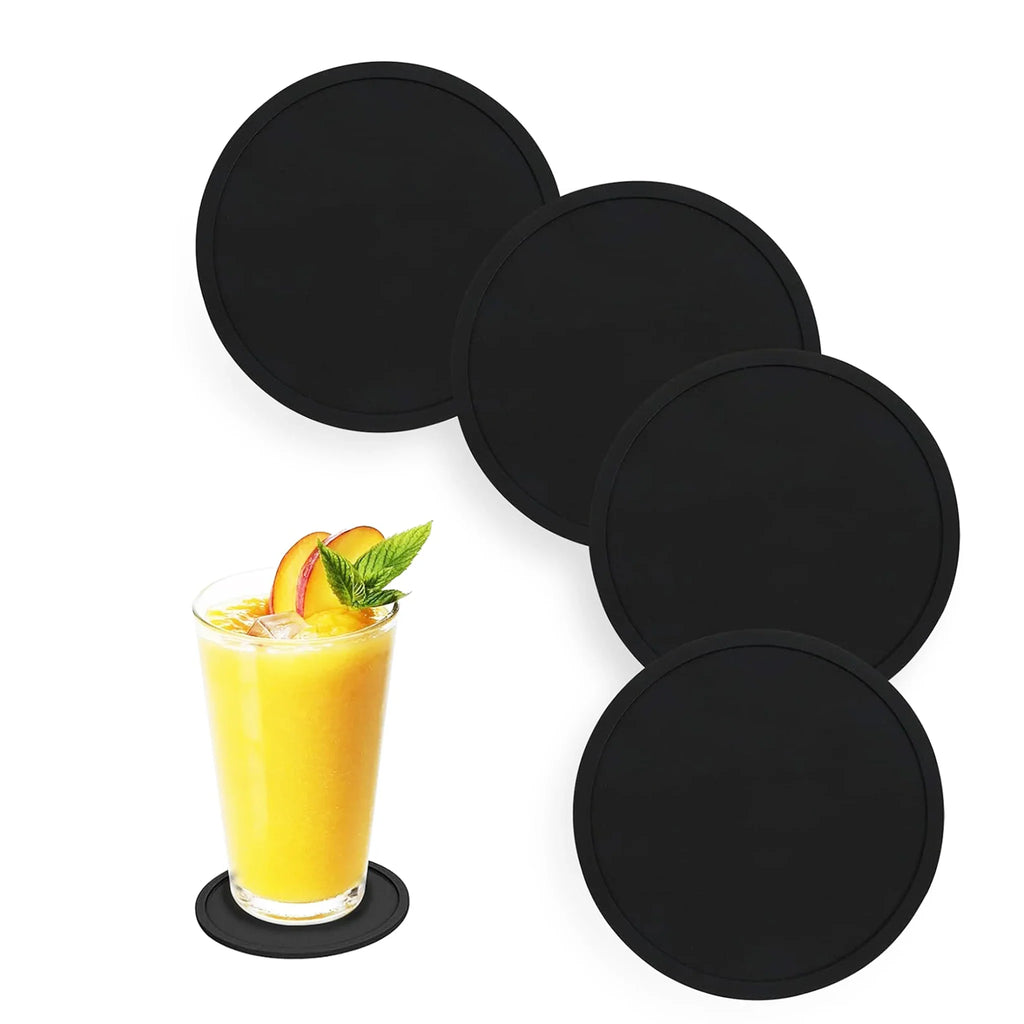 Set of round black silicone drink coasters