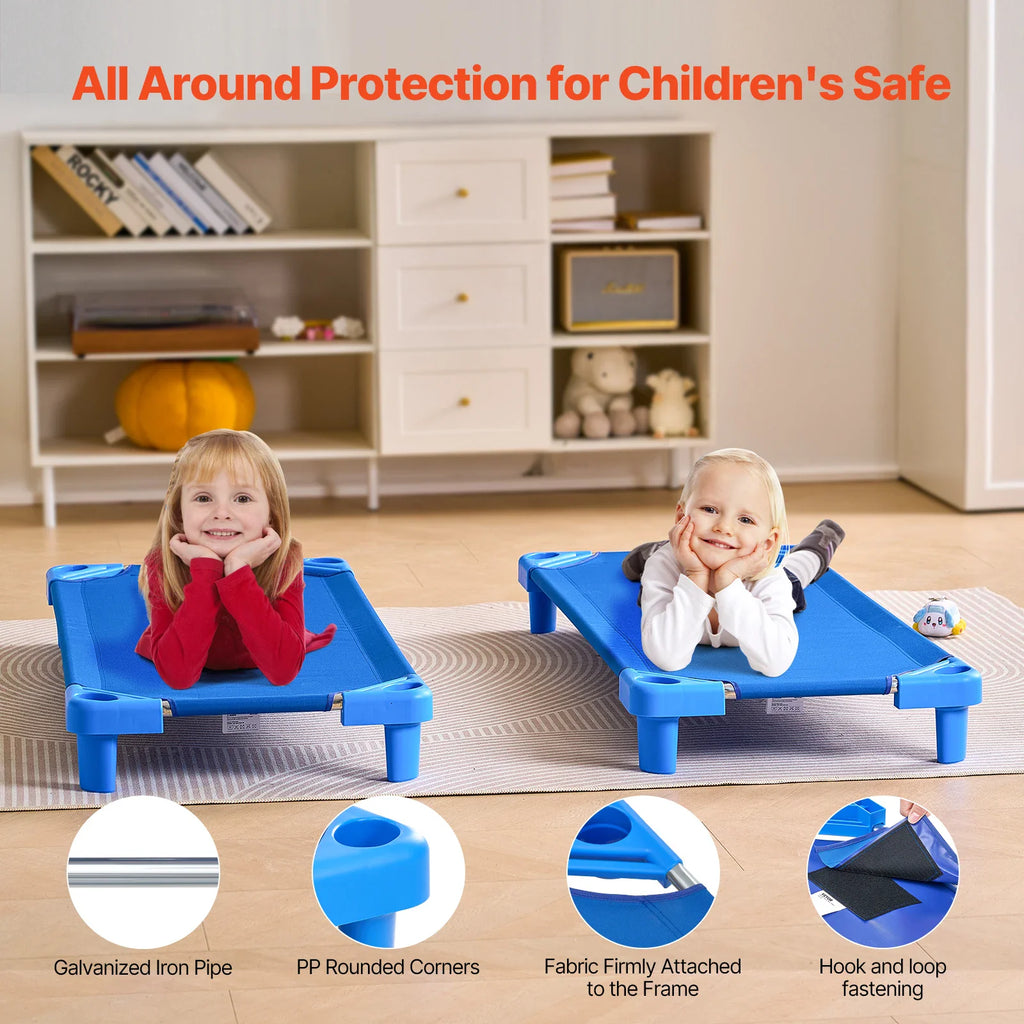 Two children resting on blue nap cots, showing product features like rounded corners and fabric attachments