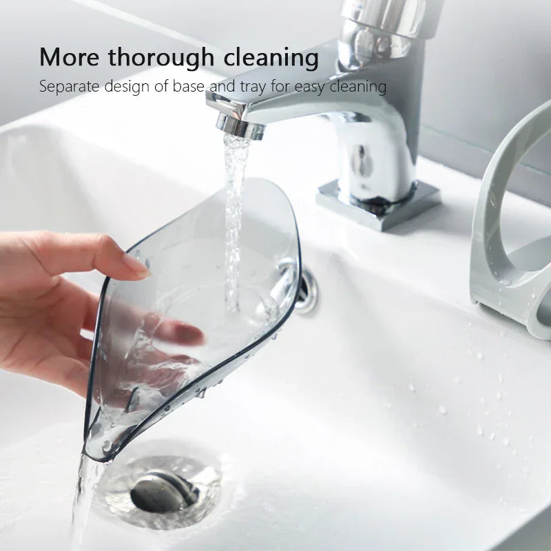 Leaf-shaped blue and grey plastic soap dish with a suction cup base – view 4